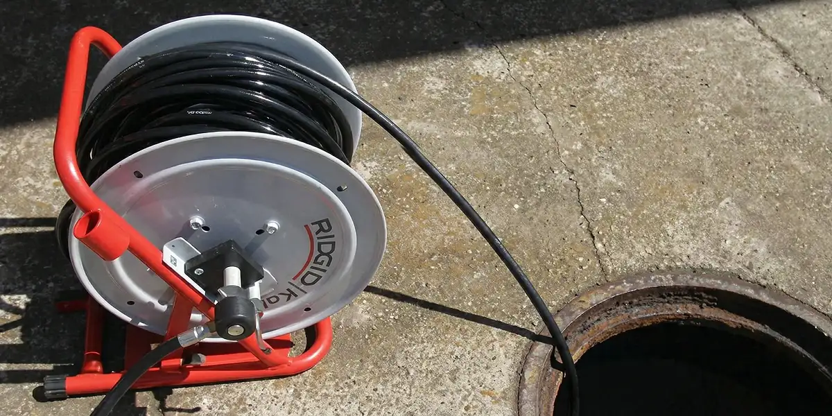 sewer rodding equipment prepared to clear clogged sewer lines in Los Angeles, CA