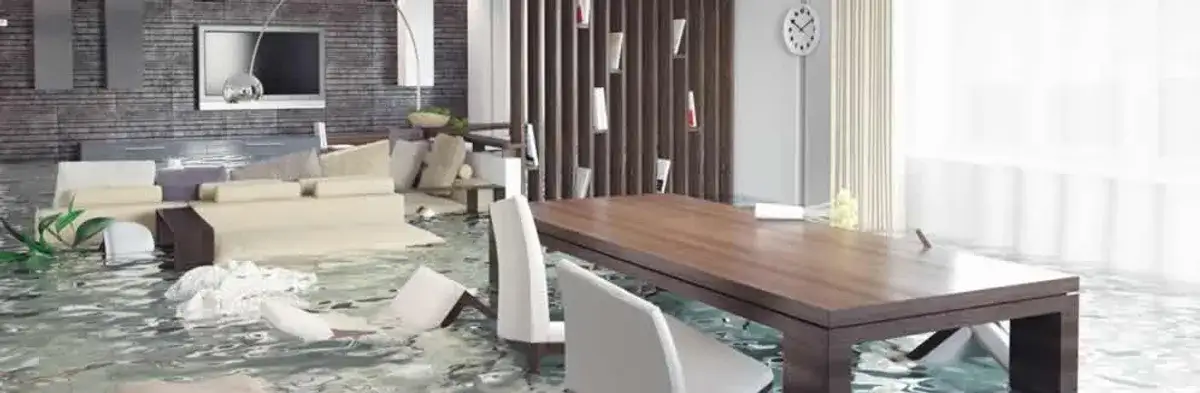 home interior affected by water damage with flooded floors and displaced furniture in Los Angeles, CA
